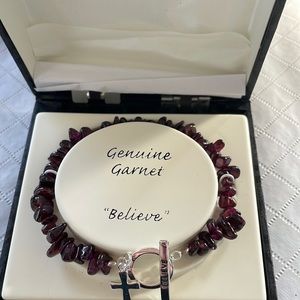 Garnet “ Believe” bracelet. Sterling Silver. New in box